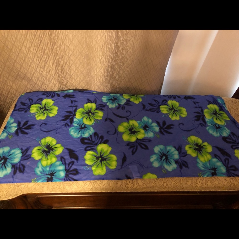 Bathing suit cover ups, different colors/patterns.